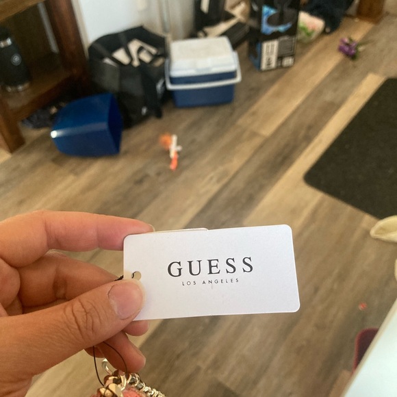 A beautiful new Guess cross body purse. - Picture 8 of 11